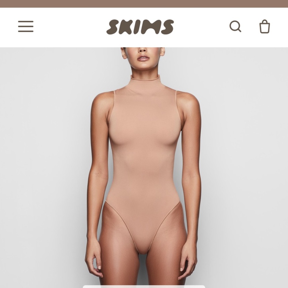 ESSENTIAL MOCK NECK SLEEVELESS BODYSUIT